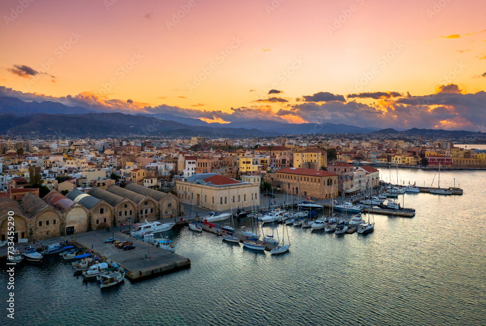 Chania with the amazing lighthouse, mosque, venetian shipyards, at sunset, Crete, Greece. - obrazy, fototapety, plakaty 