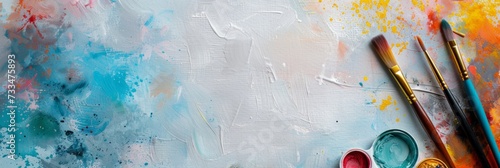 Extra wide banner header flatlay image with art paint supplies on textured canvas ideal for artistic creative painting product mockup, scene creator, text background, copy space