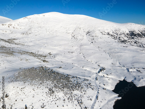 Winter view of Rila mountain around Belmeken Dam, Bulgaria photo