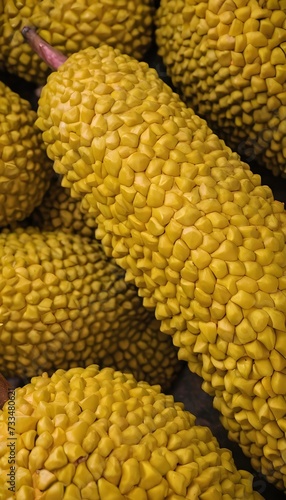 An up-close look at some ripe, vibrant jackfruit with intricate details