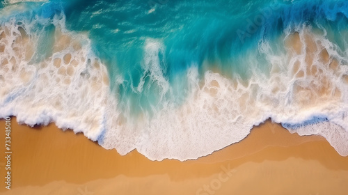 Summer seascape beautiful waves, blue sea water in sunny day. Top view from drone. 