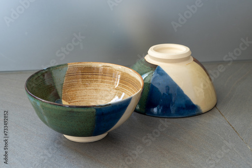 Two bowls on a grey table. High quality photo © Olivier