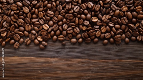 Coffee beans. On a wooden background. Top view. Copy space.