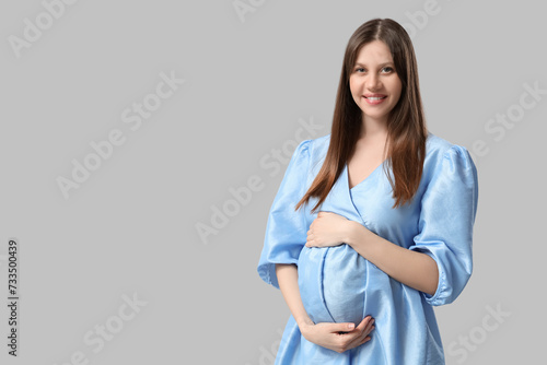 Beautiful young pregnant wo...