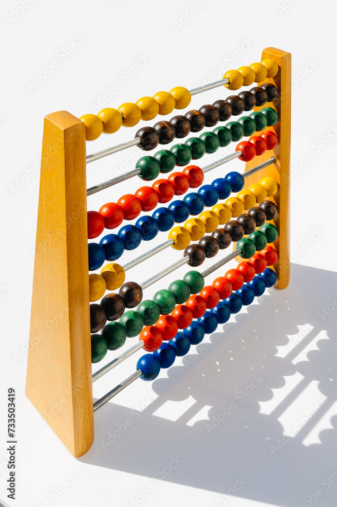 wooden children's abacus with colored beads to learn to count wooden children's abacus with colored beads to learn to count