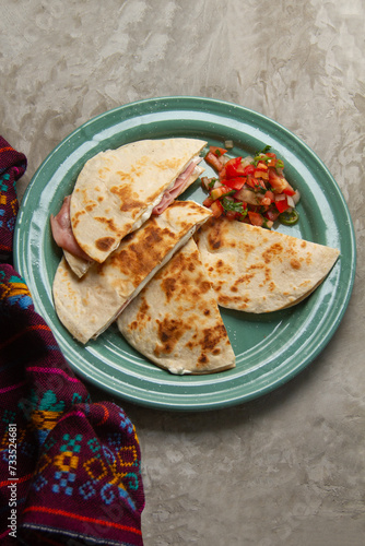 Savory stacks: Sincronizadas with melted cheese and ham. photo