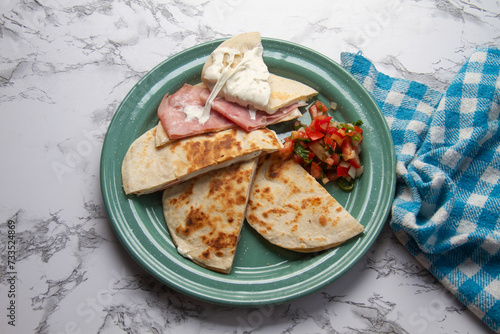 Savory stacks: Sincronizadas with melted cheese and ham. photo