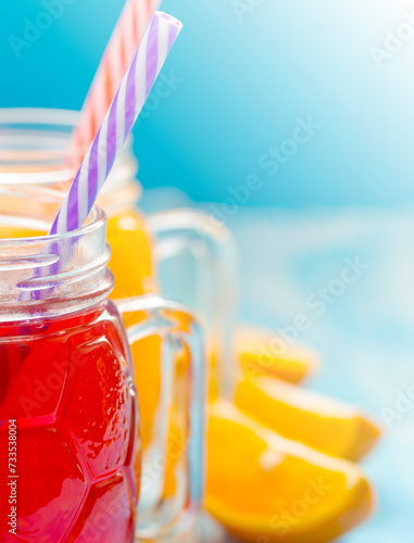 Fresh pineapple and strawberry smoothie in glasses with fruits
