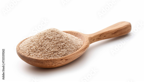 Psyllium Husk in a wooden spoon on a white background.