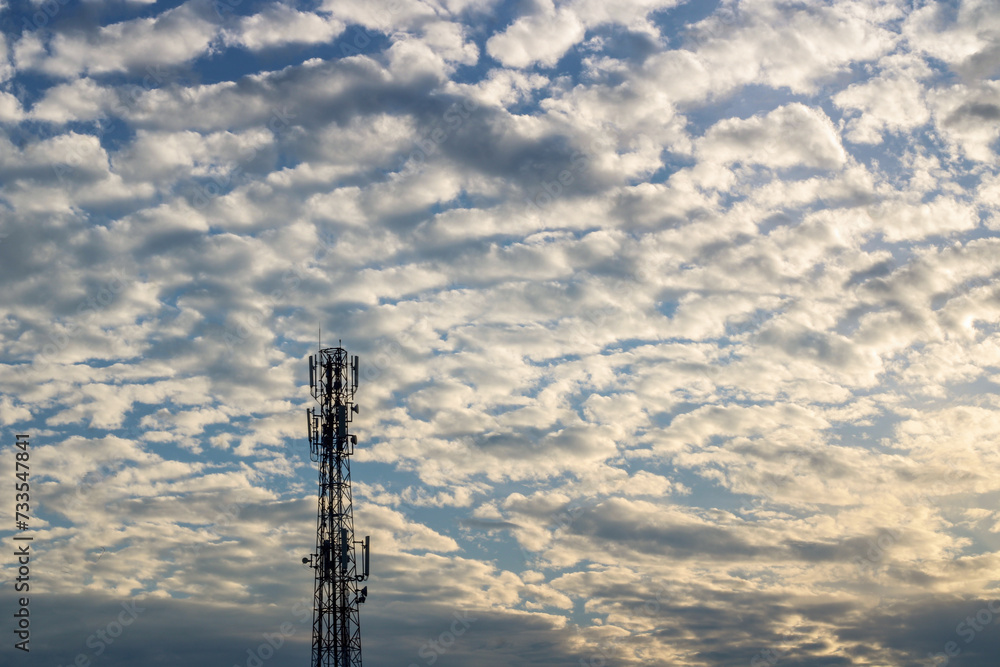 Base Transceiver Station tower with cirrocumulus clouds Base Transceiver Station tower with cirrocumulus clouds