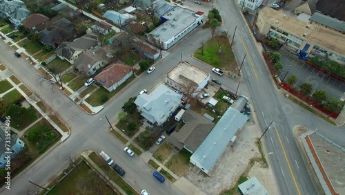 Aerial Backward Tilt Up Shot Of Residential Houses And Buildings In City - San Antonio, Texas photo