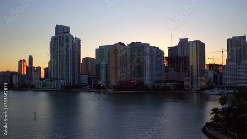 Wallpaper Mural Aerial: Drone Panning Beautiful View Of Residential Buildings In City Against Clear Sky, Drone Flying Over Rippled Sea At Sunset - Miami, Florida Torontodigital.ca