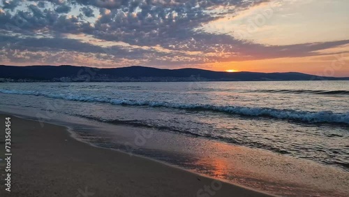 Wallpaper Mural Seascape dawn scene, natural vertical background. Early morning on the beach with a peaceful view to the sunrise above the hills. Calm summer holiday, sea travel concept Torontodigital.ca