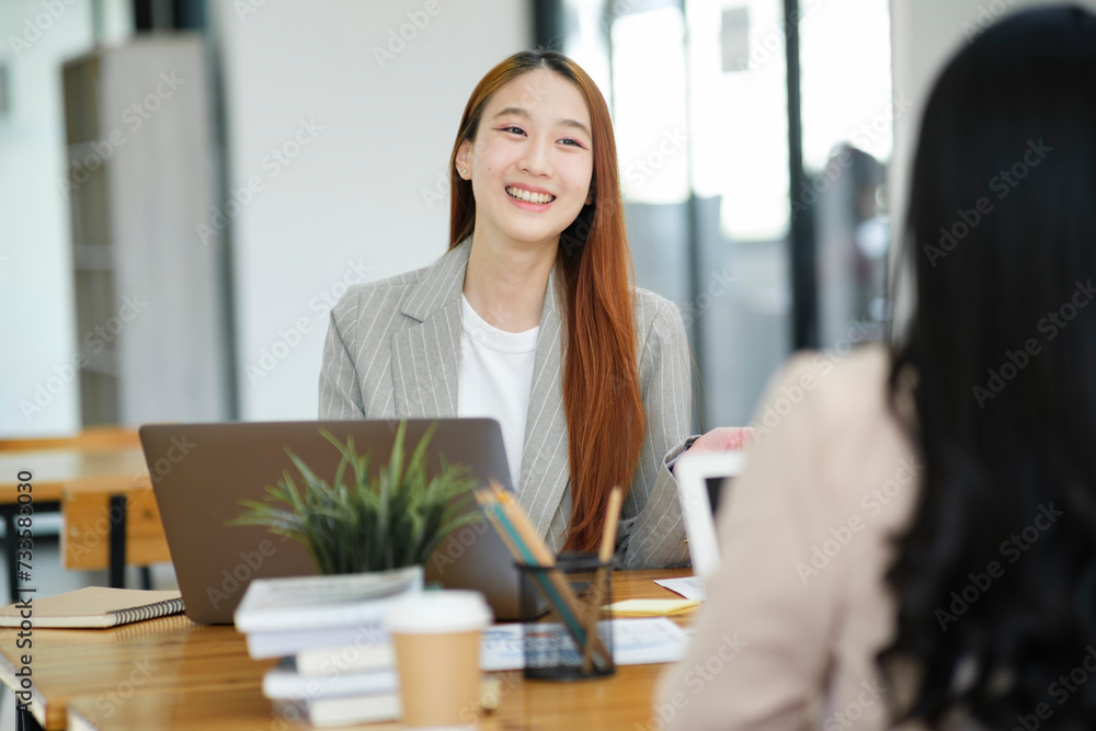 Businesswoman having a job interview with a candidate in the position of secretary to help with business and as a consultant. Businesswoman having a job interview with a candidate in the position of secretary to help with business and as a consultant.