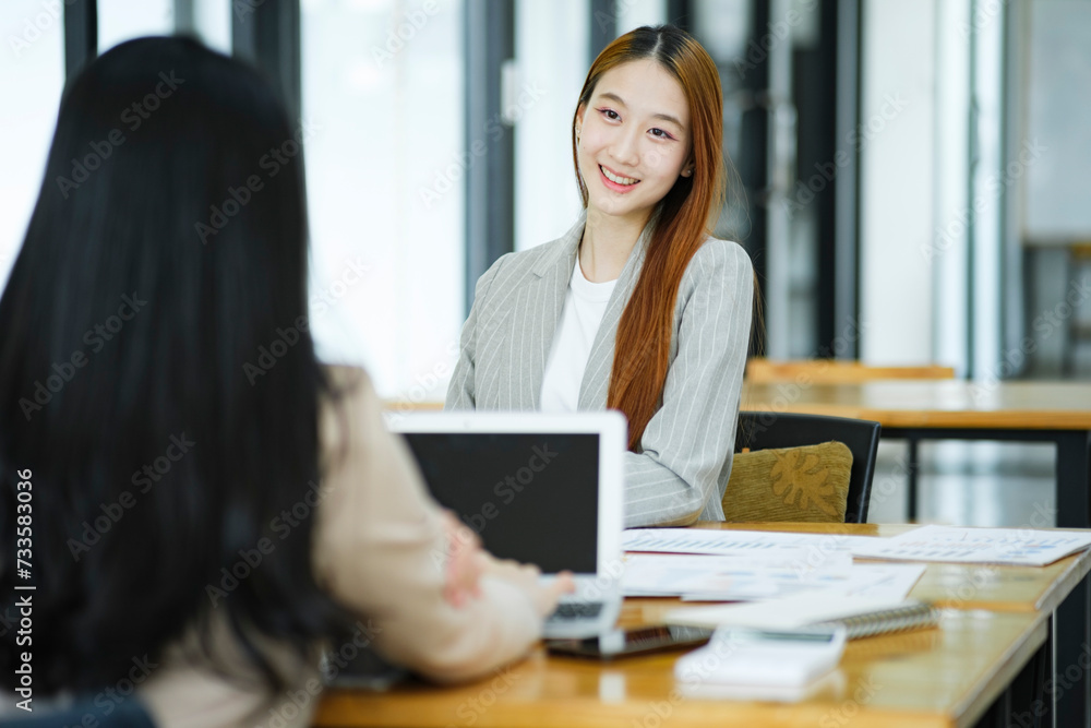 Businesswoman having a job interview with a candidate in the position of secretary to help with business and as a consultant. Businesswoman having a job interview with a candidate in the position of secretary to help with business and as a consultant.