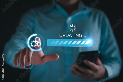 Software update or operating system upgrade concept. Man working and install software data update process in computer. Software new versions improved efficiency and security. Internet system upgrade