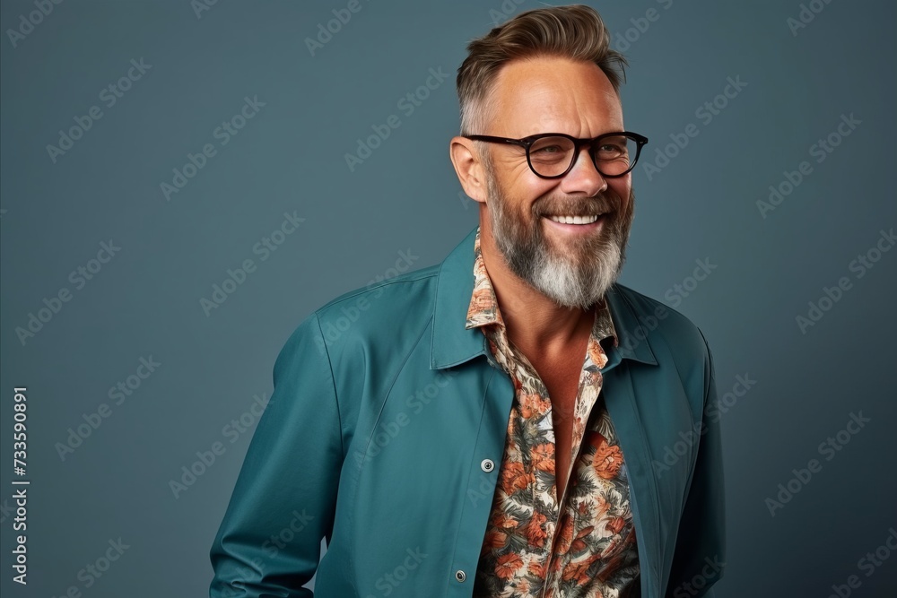 Portrait of a handsome middle-aged man wearing glasses and a shirt. Portrait of a handsome middle-aged man wearing glasses and a shirt.