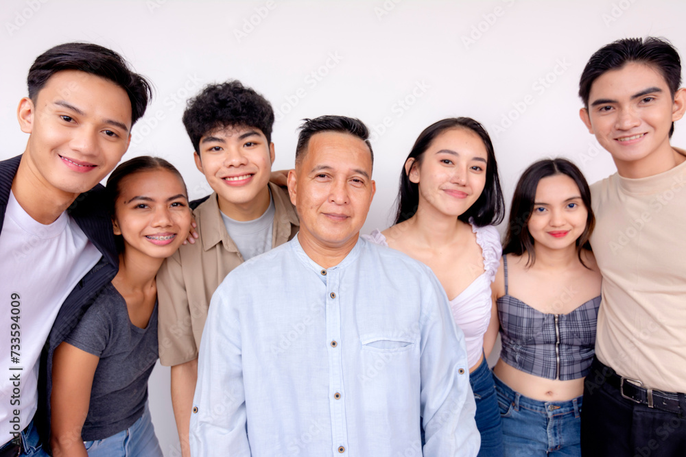 6 young interns posing with their boss. Startup company showing solidarity and unity. 6 young interns posing with their boss. Startup company showing solidarity and unity.