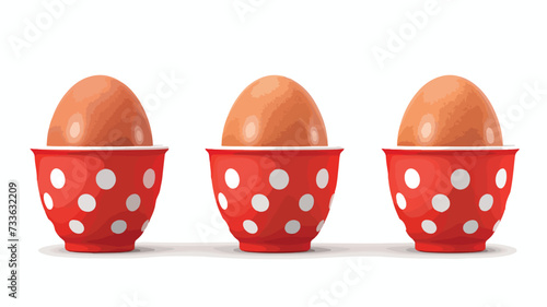 Red plastic egg cups decorated with white photo