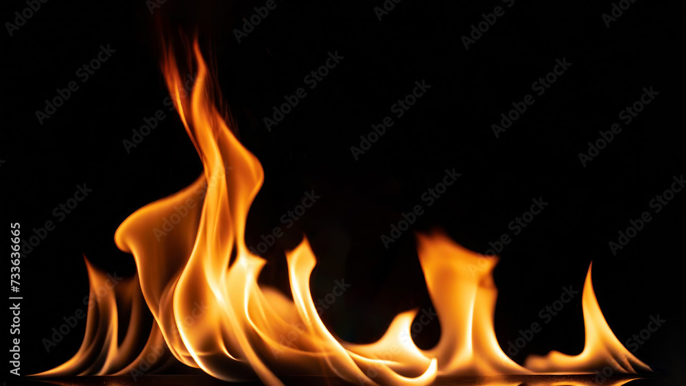 A dynamic fire flame dances against a dark backdrop, ideal for illustrating concepts of energy, passion, or the ephemeral nature of life. A dynamic fire flame dances against a dark backdrop, ideal for illustrating concepts of energy, passion, or the ephemeral nature of life.