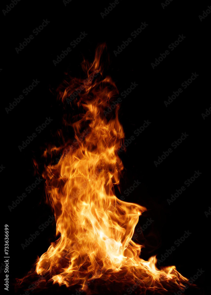 A dynamic fire flame dances against a dark backdrop, ideal for illustrating concepts of energy, passion, or the ephemeral nature of life. A dynamic fire flame dances against a dark backdrop, ideal for illustrating concepts of energy, passion, or the ephemeral nature of life.
