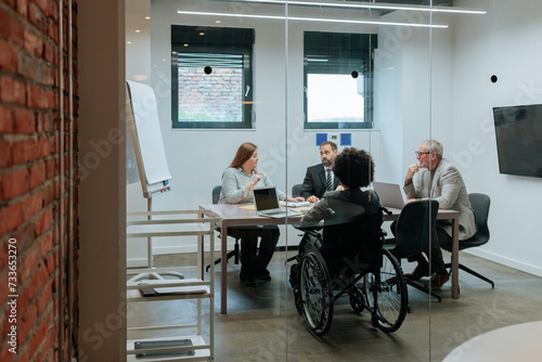 Elderly individuals having a work meeting