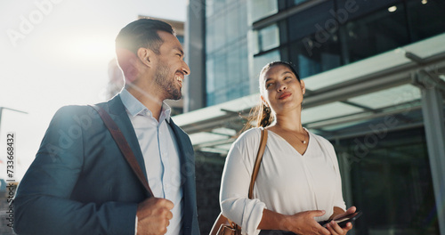 Business people, walking and travel in city with discussion on morning commute, partnership and happy. Employees, man and woman with conversation, collaboration and networking outdoor in urban town