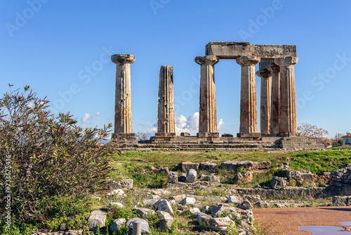Doric Temple of Apollo on city ruins, general view. Archeological park at Ancient Corinth, Greece