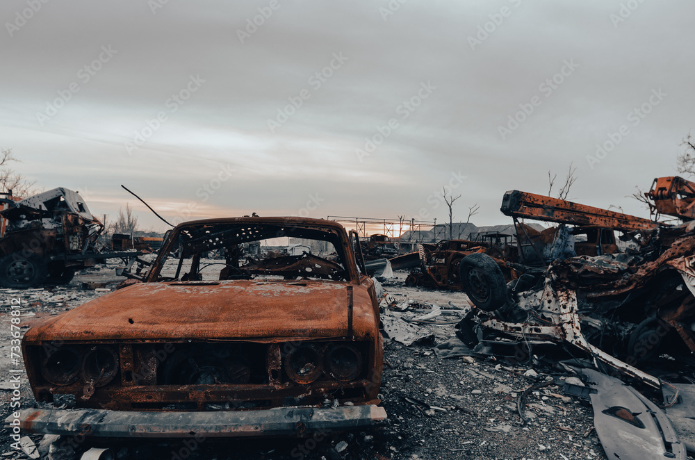 burnt cars and destroyed buildings of the workshop of the Azovstal plant in Mariupol burnt cars and destroyed buildings of the workshop of the Azovstal plant in Mariupol