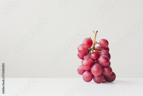 Vivid Display Of Red Grapes On Pristine White Background