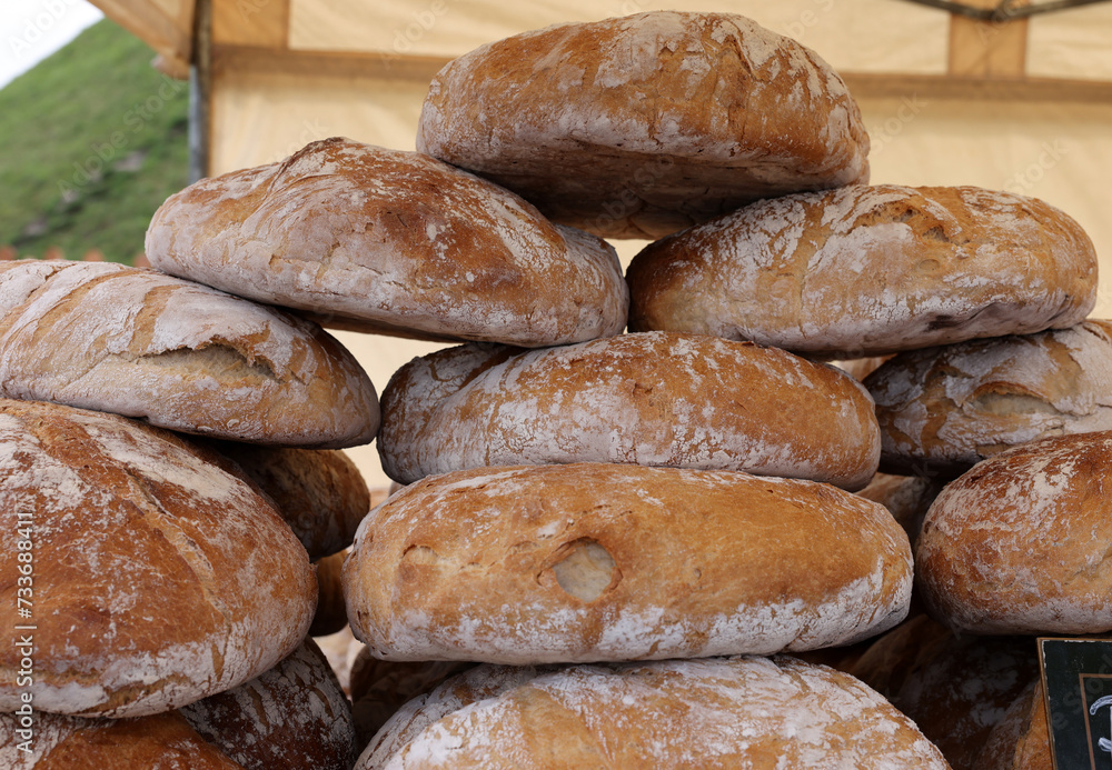 Freshly baked traditional bread at a street stall Freshly baked traditional bread at a street stall