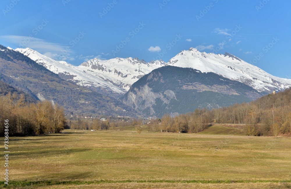 beautiful scenic landscape in alpine mountain snowy and large meadow in Savoy, europe