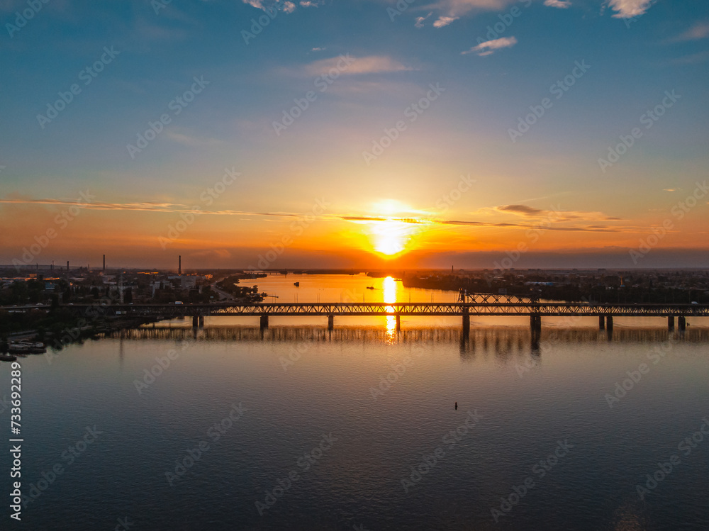 A beautiful sunset or dawn sky from a height above the city. Dnipro.Ukraine. Background picture. Dramatic evening cloud landscape in the city. Drone photography. Ukrainian city