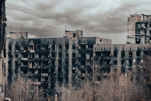 destroyed and burned houses in the city Russia Ukraine war © Sofiia