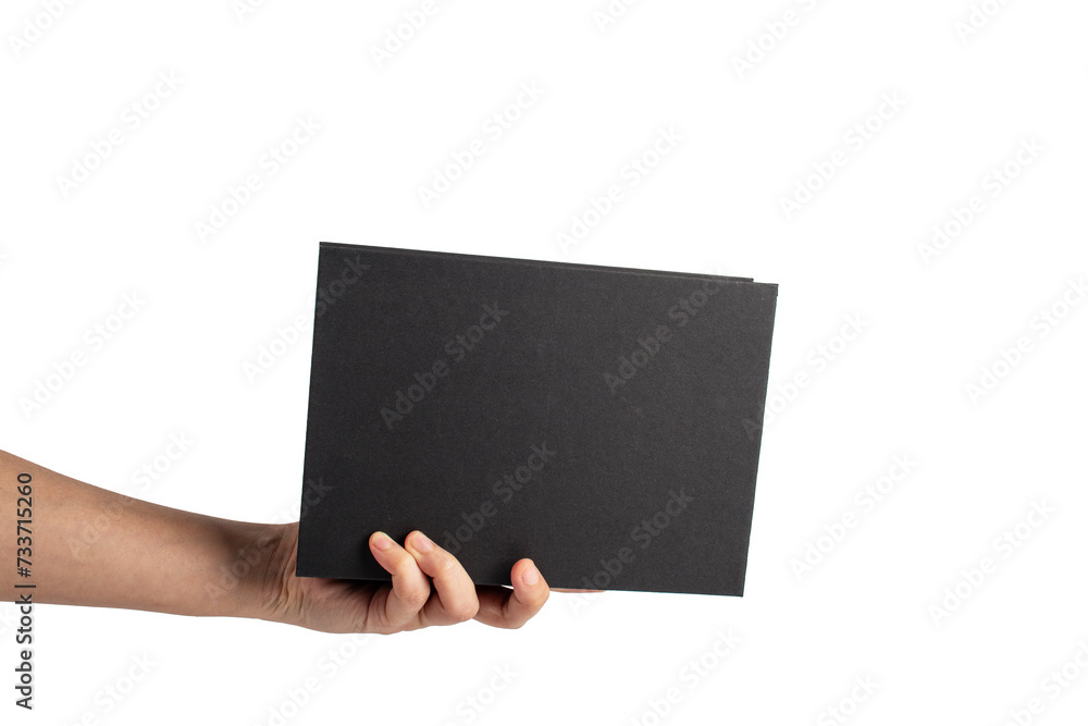 Blank black book cover in hand on transparent background. Blank black book cover in hand on transparent background.