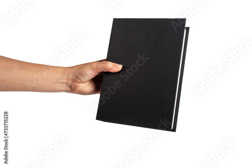 Blank black book cover in hand on transparent background.