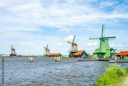 Zaanse Schans village with houses and windmills in summer, Holland