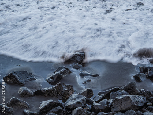 beach with black volcanic sand on  Tenerife photo