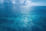 Aerial view of a blue sea surface water texture background and sun reflections Aerial flying drone view Waves water surface texture on sunny tropical ocean in Phuket island