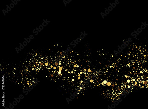 Texture of gold glitter, on a black background. Abstract golden color particles, confetti glitter explosion. Festive background.