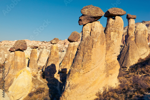 Beautiful Fairy Chimneys - picturesque extraordinary naturally formed, towering rock formations with the unique shapes. Cappadocia, Turkey