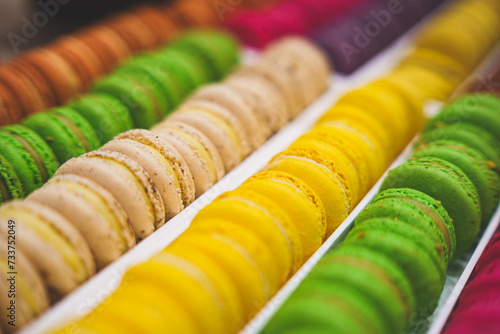 Colorful french macarons background, close up. Tasty sweet color macaroon. Bakery concept.Selective focus.