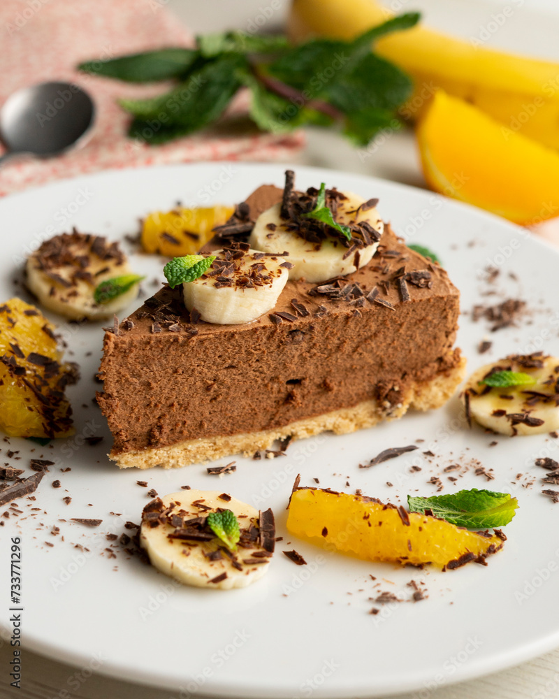 Delicious and fluffy chocolate mousse cake with banana and orange aroma. Delicious and fluffy chocolate mousse cake with banana and orange aroma.