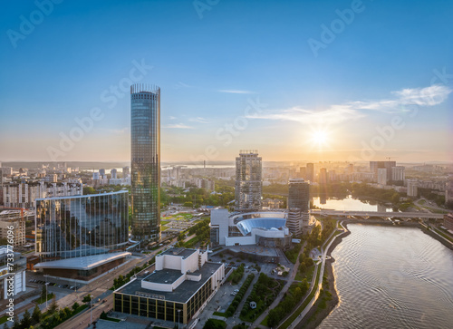 Yekaterinburg city and pond aerial panoramic view at summer sunset. © Dmitrii Potashkin
