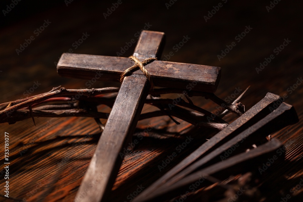 Christian cross with crown thorns on dark background. Christian cross with crown thorns on dark background.