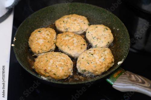 juicy appetizing homemade cutlets frying in a frying pan in the kitchen 1