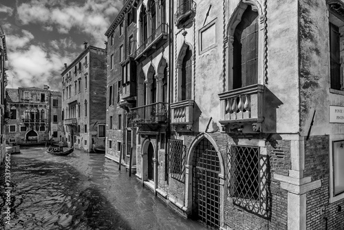 Beautiful black and white glimpse of the San Marco district on the Rio dei Barcaroli near the Frezzaria swimming pool, Venice, Italy