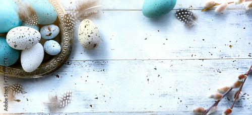  Easter background with Easter eggs on white table