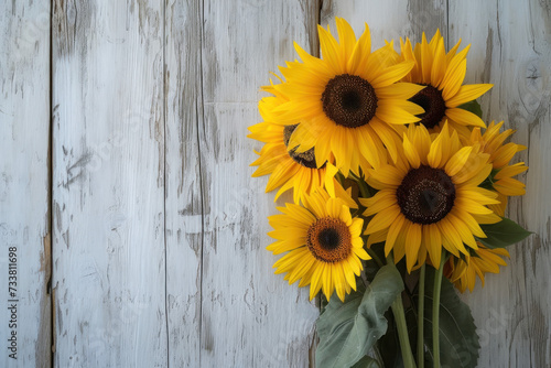 Bouquet of Sunflowers on a White Wooden Background