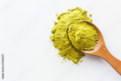 Wooden Spoon Filled With Green Powder